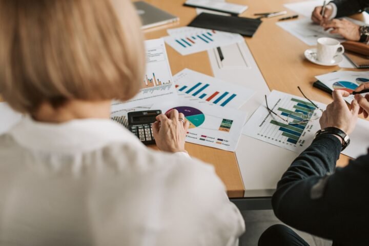 Business executives discussing Kodak's digital transformation financing challenges