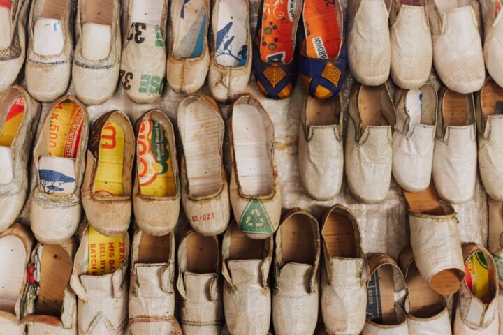 Allbirds shoes displayed with sustainable material labels and carbon footprint information