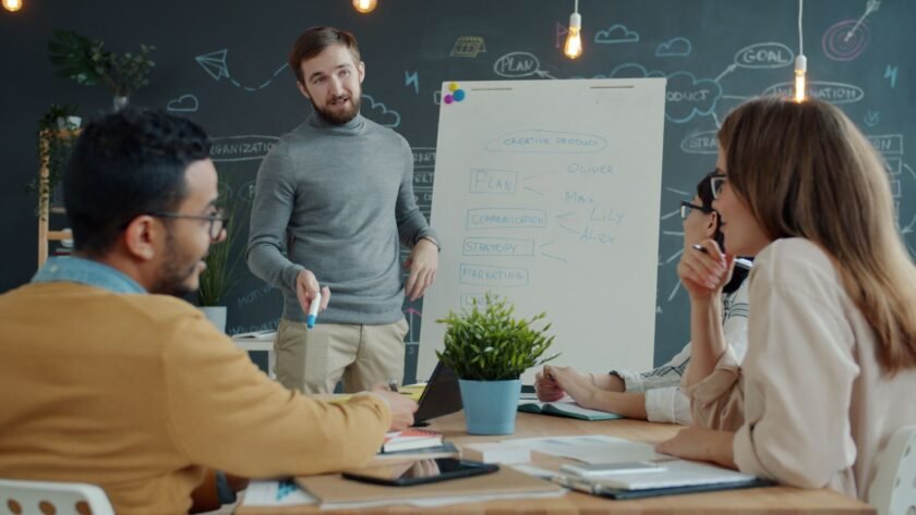 Team discussing Notion's pivot strategy in a modern office